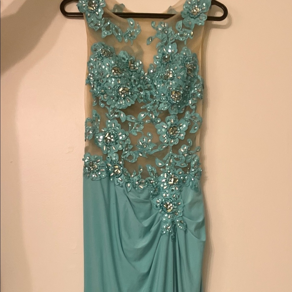 Dress in good condition,clean (has some small stains on the front)